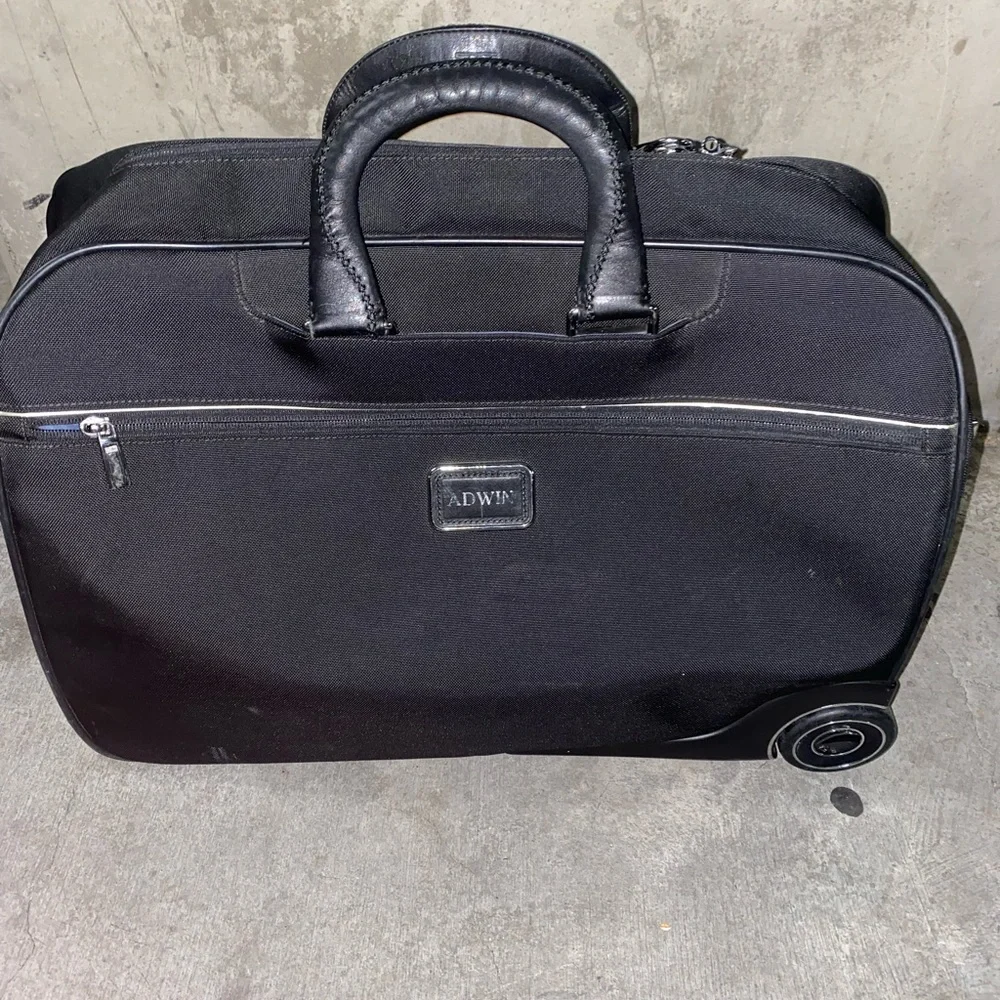 TUMI Rolling Weekender Carry-on